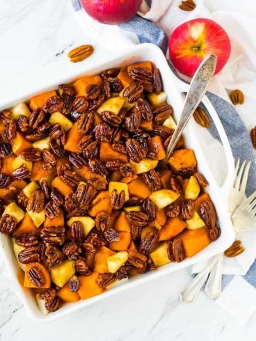 Glazed Sweet Potato Bake with Cinnamon Butter Pecans. The BEST sweet potatoes for Thanksgiving, Christmas, or anytime you need a great side dish recipe. Recipe at wellplated.com | @wellplated
