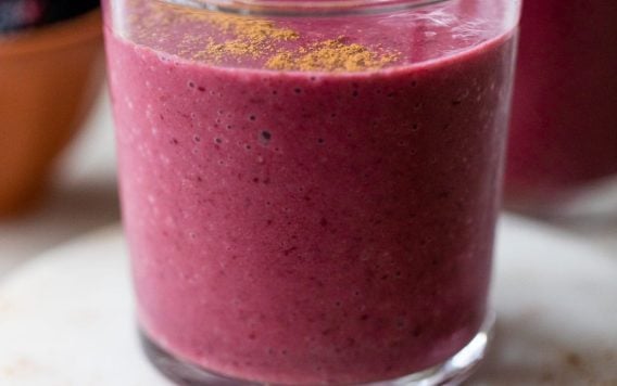 a glass of a blackberry smoothie for weightloss