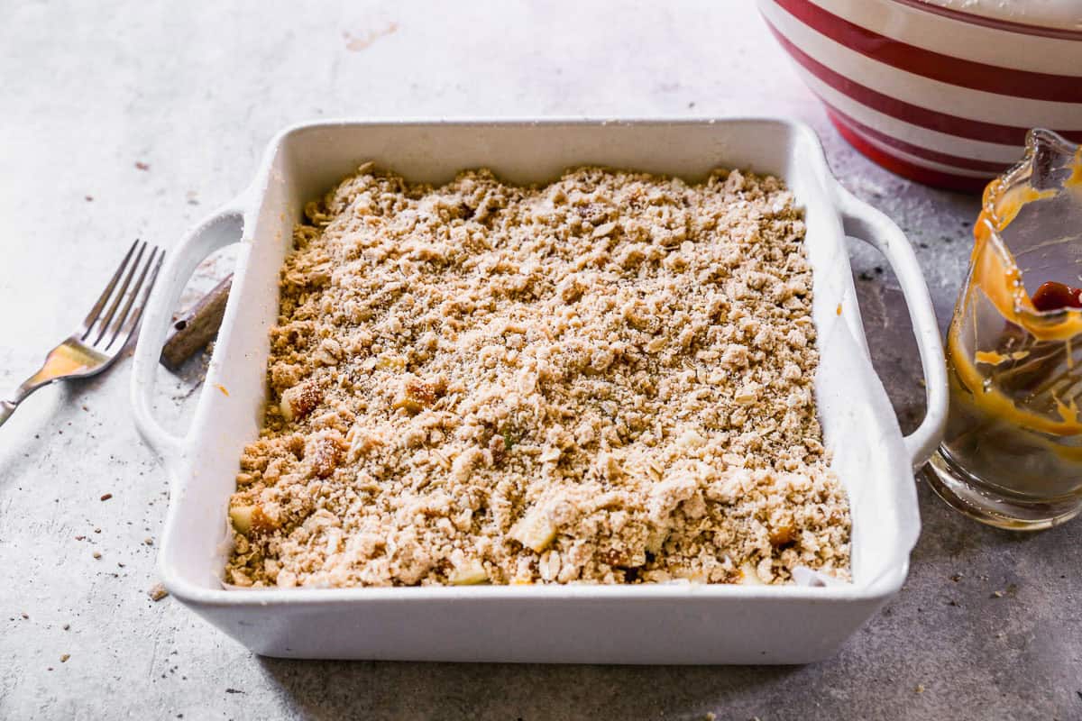 Caramel apple bars in baking dish before baking