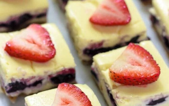 Red White and Blueberry Cheesecake Bars. The perfect dessert for the Fourth of July!
