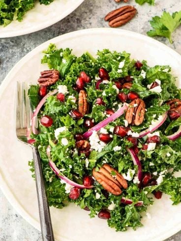 Make ahead Kale Salad with Pomegranate and Pecans. Our favorite winter salad recipe!