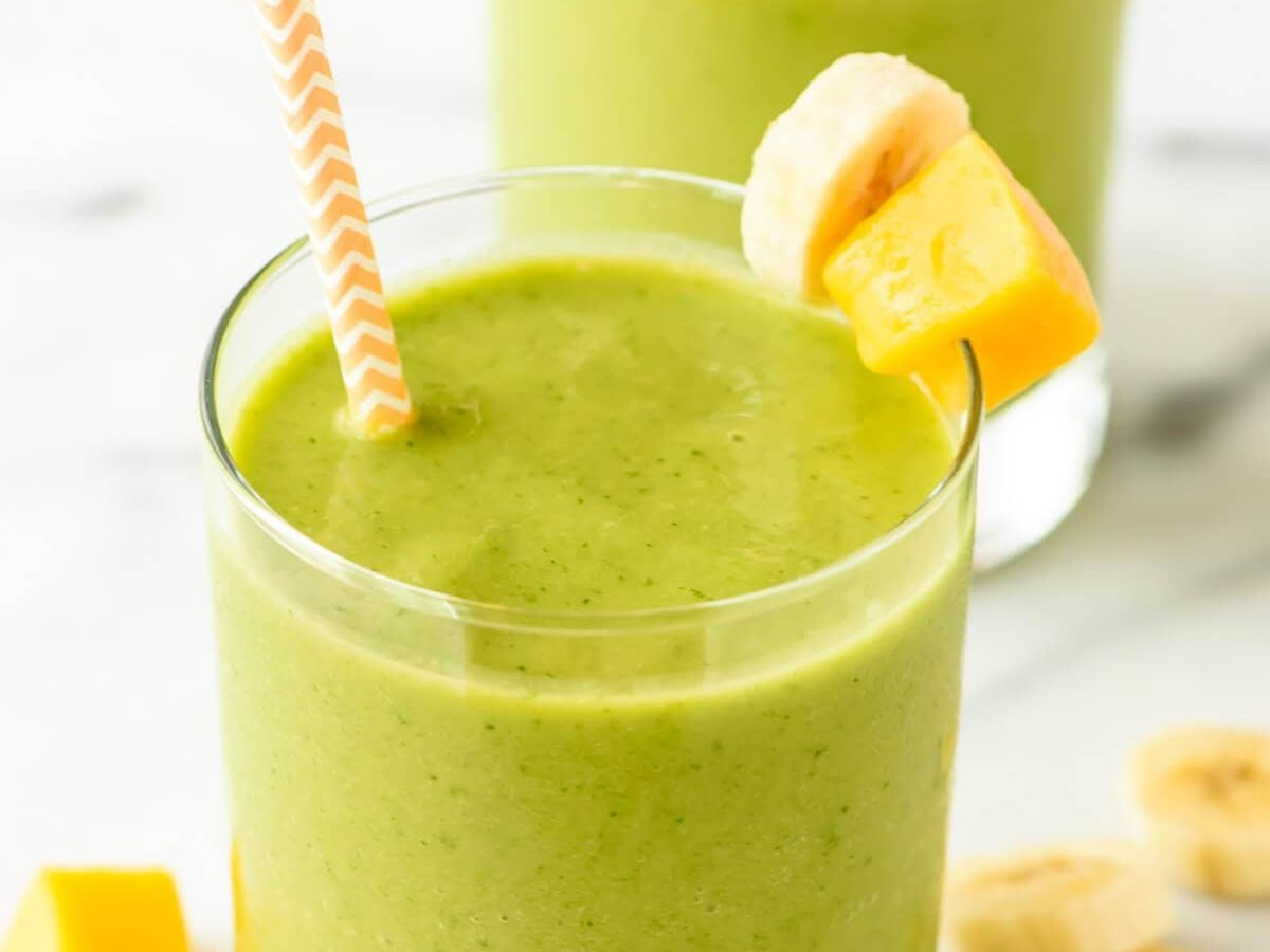 4 Ingredient Mango Green Smoothie — Tastes like a tropical vacation! Sweet, creamy, healthy and filled with vitamins. Kids love it too! {vegan, gluten free, and dairy free with no sugar added!}