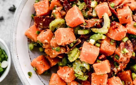 a bowl the best sweet potato salad recipe with bacon and celery