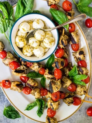 These Grilled Pesto Chicken Kebabs are the perfect summer dish! EASY recipe with ONLY THREE INGREDIENTS โ Serve as appetizer at your next backyard bash, or have them for dinner any night of the week. Healthy and delicious! @wellplated