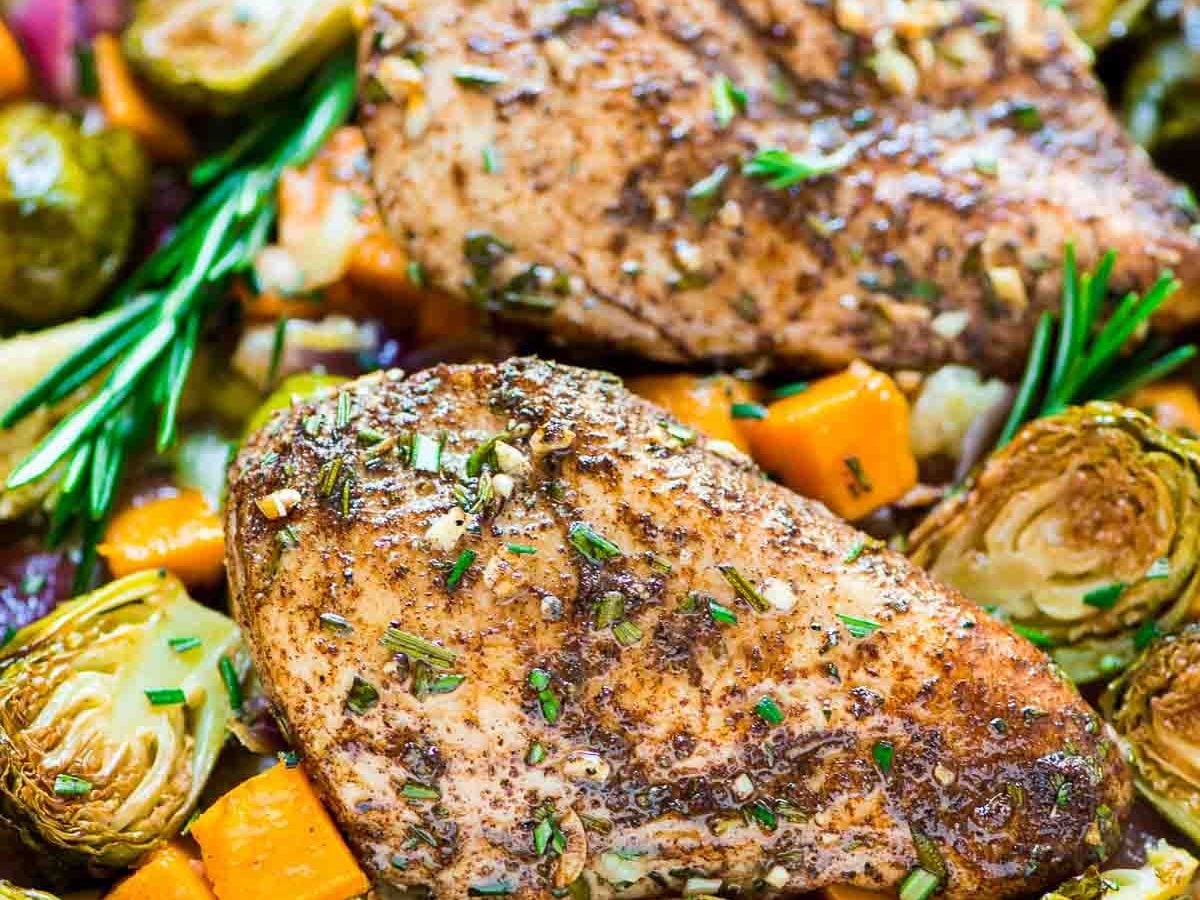 ONE PAN Paleo Harvest Chicken Dinner with Apples, Sweet Potatoes, and Brussels Sprouts. Easy and healthy sheet pan recipe that’s perfect for busy weeknights. {Paleo, Gluten Free, and Dairy Free!} @wellplated
