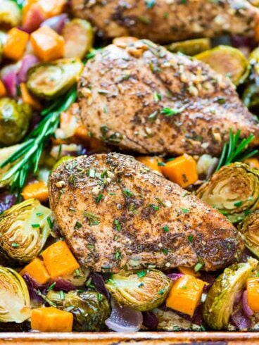 ONE PAN Paleo Harvest Chicken Dinner with Apples, Sweet Potatoes, and Brussels Sprouts. Easy and healthy sheet pan recipe that’s perfect for busy weeknights. {Paleo, Gluten Free, and Dairy Free!} @wellplated