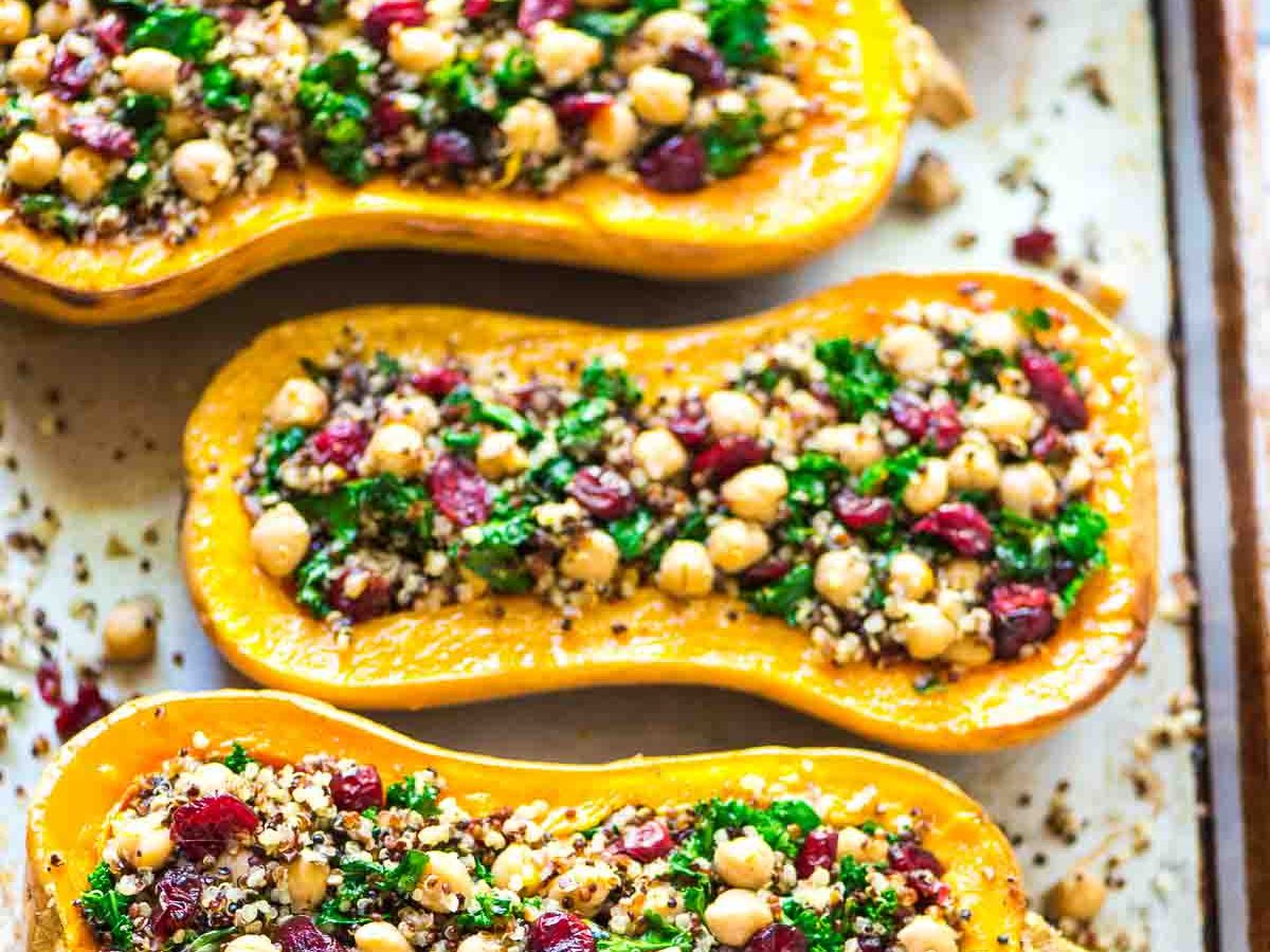 Delicious, healthy Stuffed Butternut Squash with Quinoa, Cranberries, Kale, and Chickpeas. An easy vegetarian recipe that everyone will love! | Recipe at wellplated.com @wellplated
