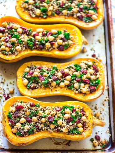 Delicious, healthy Stuffed Butternut Squash with Quinoa, Cranberries, Kale, and Chickpeas. An easy vegetarian recipe that everyone will love! | Recipe at wellplated.com @wellplated
