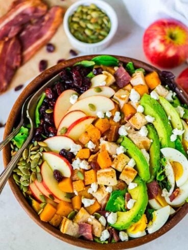 Harvest Cobb Salad. A fall twist on classic Cobb salad with butternut squash, bacon, apples, and goat cheese. Chicken and avocado make it healthy and filling. Perfect as a main dish salad or for Thanksgiving, Christmas, or anytime you need a great holiday side dish. Recipe at wellplated.com | @wellplated