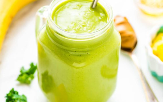 Banana Kale Pineapple Smoothie — the BEST, most delicious green smoothie! Packed with protein, it keeps you full, so it’s great for weightloss or detox. Easy, healthy, and even kids love it! Recipe at wellplated.com | @wellplated