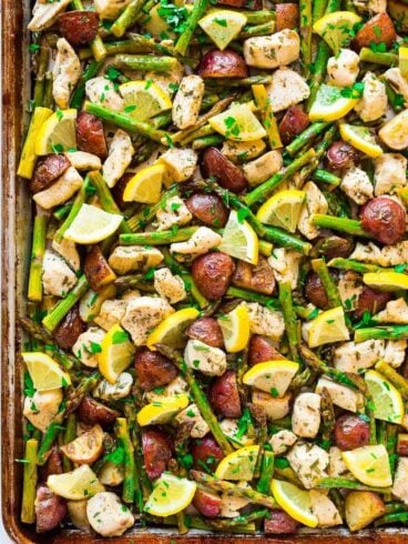 Easy, healthy Baked Lemon Chicken with Garlic and Rosemary. Add asparagus and potatoes for a DELICIOUS sheet pan meal that’s perfect for busy weeknights! The veggies are crispy, the chicken juicy, and the flavors so fresh. Our family loves this simple meal! Recipe at wellplated.com | @wellplated