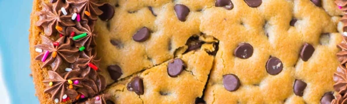 The BEST homemade Chocolate Chip Cookie Cake with Chocolate Fudge Frosting. Ultra soft, ultra chewy, and DELICIOUS. Decorate for a birthday or make anytime you need an easy dessert that everyone will love! Recipe at wellplated.com | @wellplated
