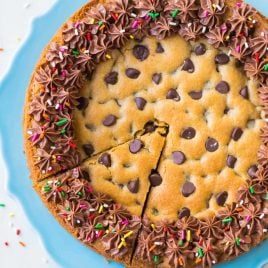The BEST homemade Chocolate Chip Cookie Cake with Chocolate Fudge Frosting. Ultra soft, ultra chewy, and DELICIOUS. Decorate for a birthday or make anytime you need an easy dessert that everyone will love! Recipe at wellplated.com | @wellplated