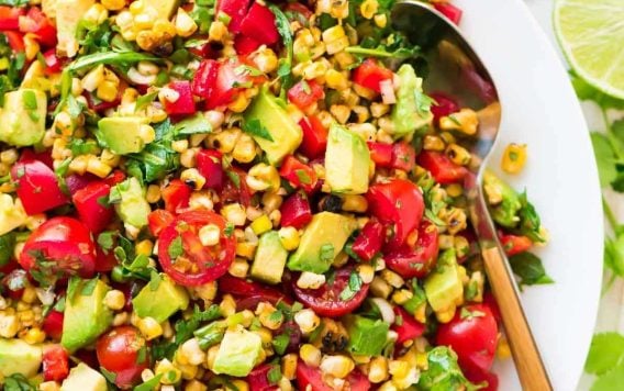 Grilled Corn Salad with Avocado, Tomato and Arugula. Summer’s best side dish! Simple, delicious, and healthy recipe that’s great for picnics, barbecues, and weeknight dinners. {gluten free} Recipe at wellplated.com | @wellplated