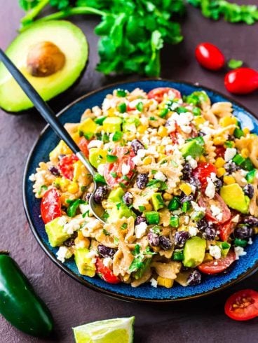 Creamy Mexican Pasta Salad with corn, black beans, avocado, and a delicious Greek yogurt dressing made with chili and lime juice. Easy, healthy, and always a favorite! Perfect picnics, potlucks, or a light summer dinner. Recipe at wellplated.com | @wellplated
