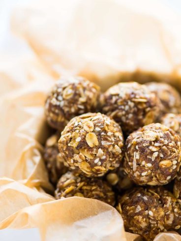 No Bake Ginger Cookie Healthy Energy Balls — easy, high protein, and great for your skin! Raw vegan recipe with oatmeal, coconut, warm spices, and flaxseed. Naturally sweetened and no food processor required! Recipe at wellplated.com | @wellplated
