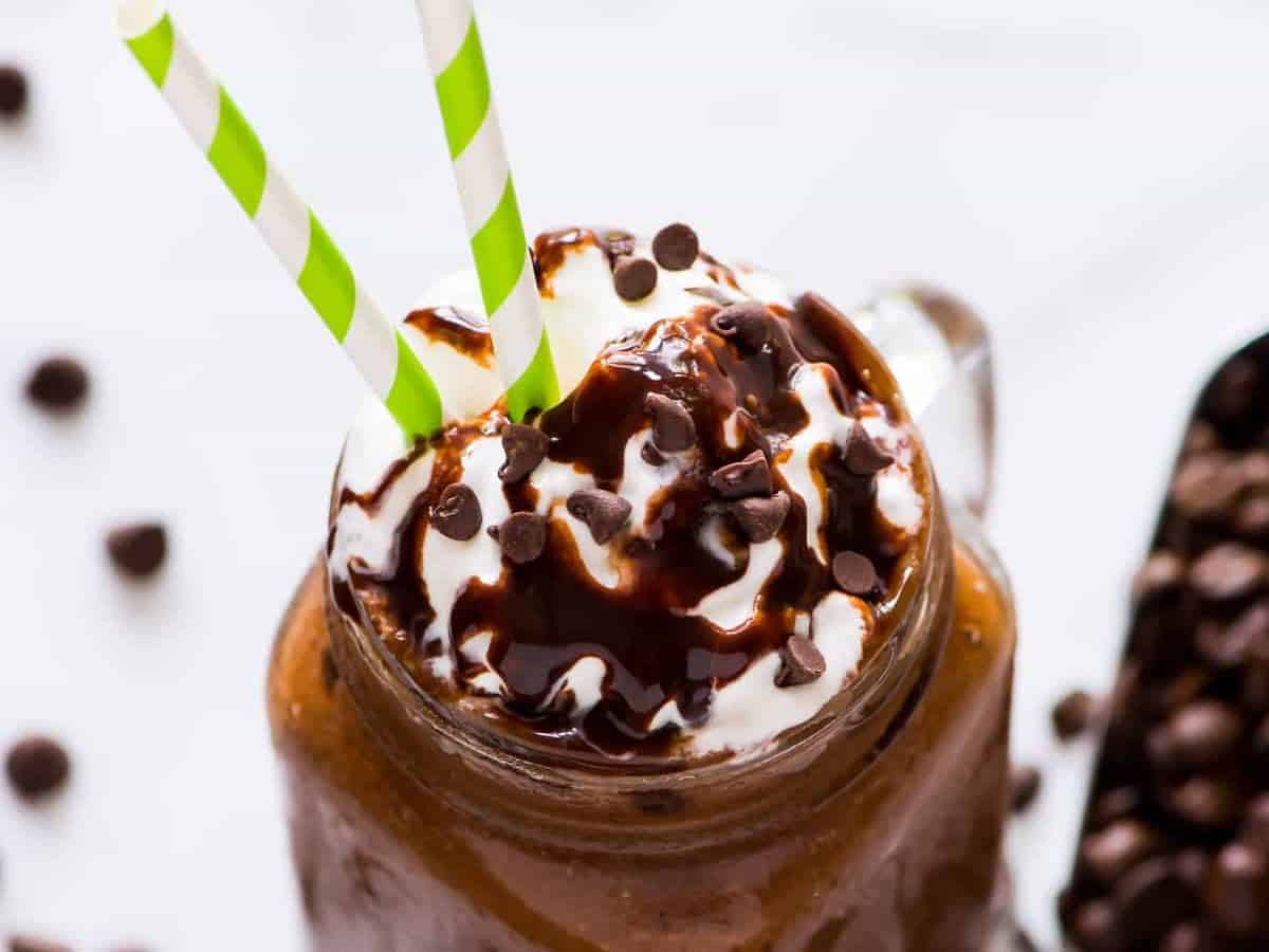 This easy, healthy homemade Starbucks Mocha Frappuccino recipe is low calorie, vegan, and so delicious! Even better than the original and perfect for coffee frappuccino lovers. Recipe at wellplated.com | @wellplated