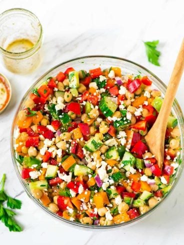 Healthy Mediterranean Chickpea Salad with feta, cucumber, bell peppers, and a simple Greek dressing. Fast, easy recipe that’s perfect for a summer barbecue side dish or a main dish salad for a light dinner. {vegetarian, gluten free, vegan friendly} Recipe at wellplated.com | @wellplated