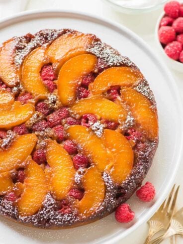 Unbelievably moist, delicious Peach Upside Down Cake FROM SCRATCH. Easy, homemade recipe made with healthy ingredients and the most incredible caramel topping. You can use fresh or frozen peaches, or add raspberries or any other fruit you love. One of the BEST summer desserts! Recipe at wellplated.com | @wellplated