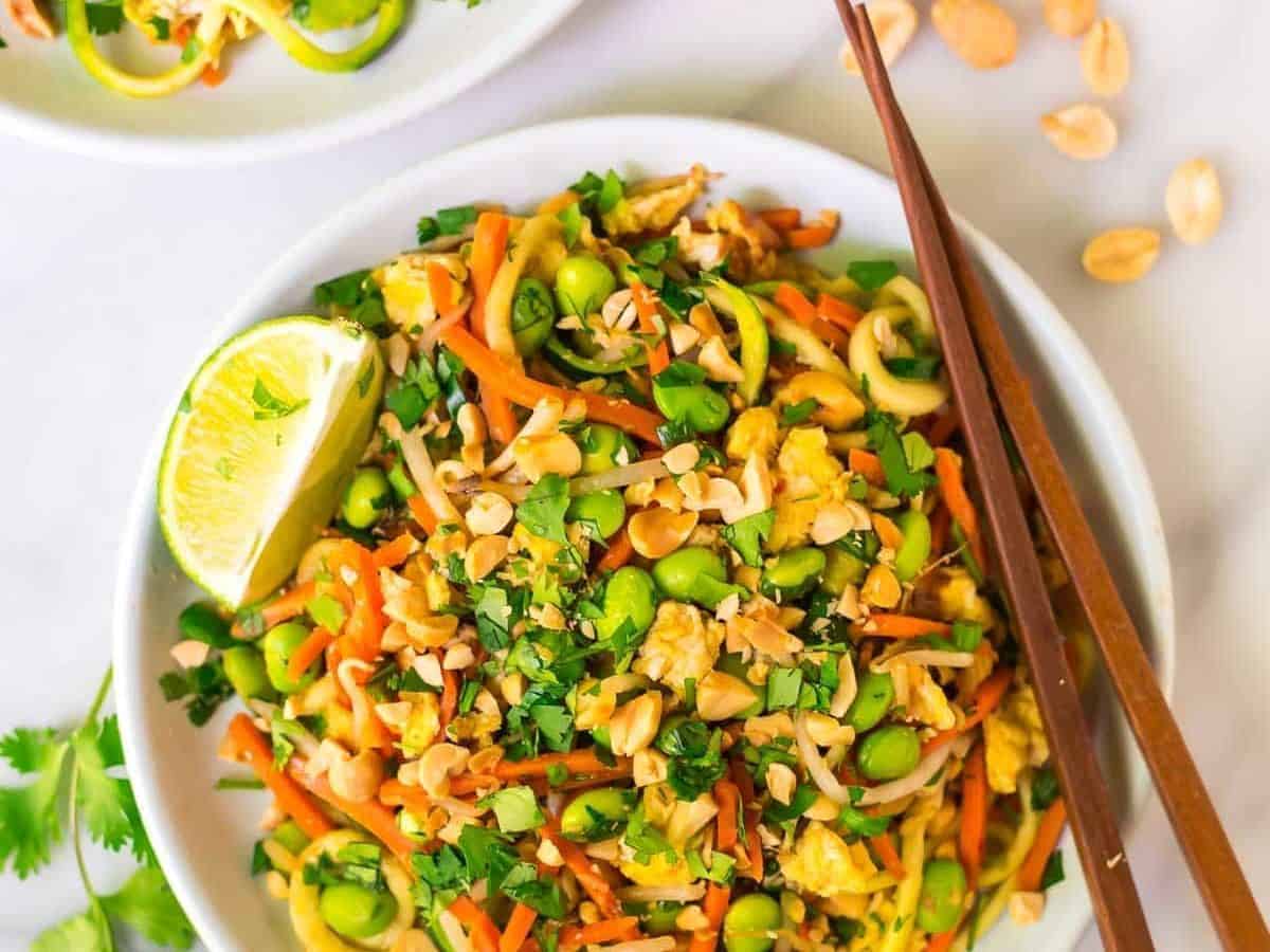 Easy Vegetarian Pad Thai with Zucchini Noodles. Full of protein and flavor, not too spicy, gluten free, and low carb! This fast and healthy one pot meal is perfect for busy families and weeknight dinner. Recipe at wellplated.com | @wellplated