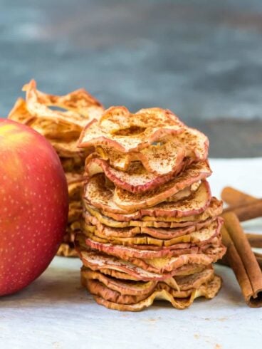 Crispy Baked Apple Chips. Simple oven recipe with just cinnamon and apples, no sugar or dehydrator needed! Easy, healthy, and so much better than store bought. Kids love them and they are great for gifts and healthy snacks. Recipe at wellplated.com