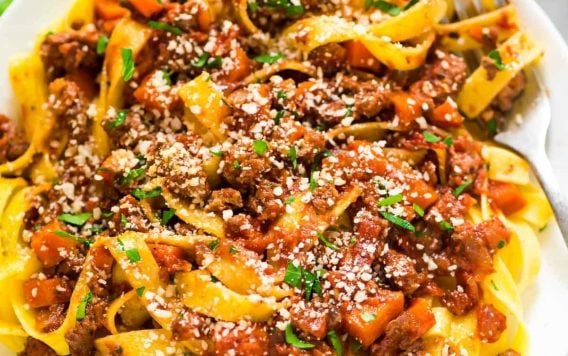 Healthy weeknight Turkey Bolognese. Easy recipe and tastes authentic! The thick, rich sauce tastes like it’s been simmering all day, but is ready in minutes, not hours. Recipe at wellplated.com.