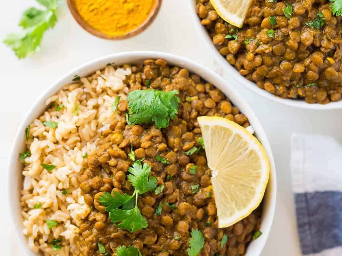 Easy, CREAMY Instant Pot Lentil Curry. Amazing flavors, not too spicy, and it&rsquo;s hands free, vegan, and healthy! Made with green or brown lentils, Indian spices, and coconut milk.
