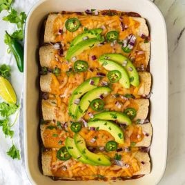 BEST EVER Easy Vegetarian Enchiladas with Butternut Squash, Black Beans, and Cheese. An easy, healthy enchilada recipe that will have you scraping the pan for more!