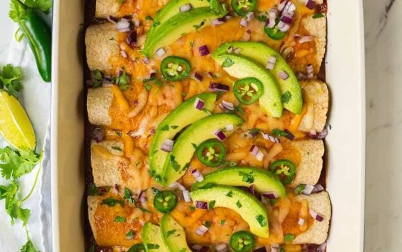 BEST EVER Easy Vegetarian Enchiladas with Butternut Squash, Black Beans, and Cheese. An easy, healthy enchilada recipe that will have you scraping the pan for more!