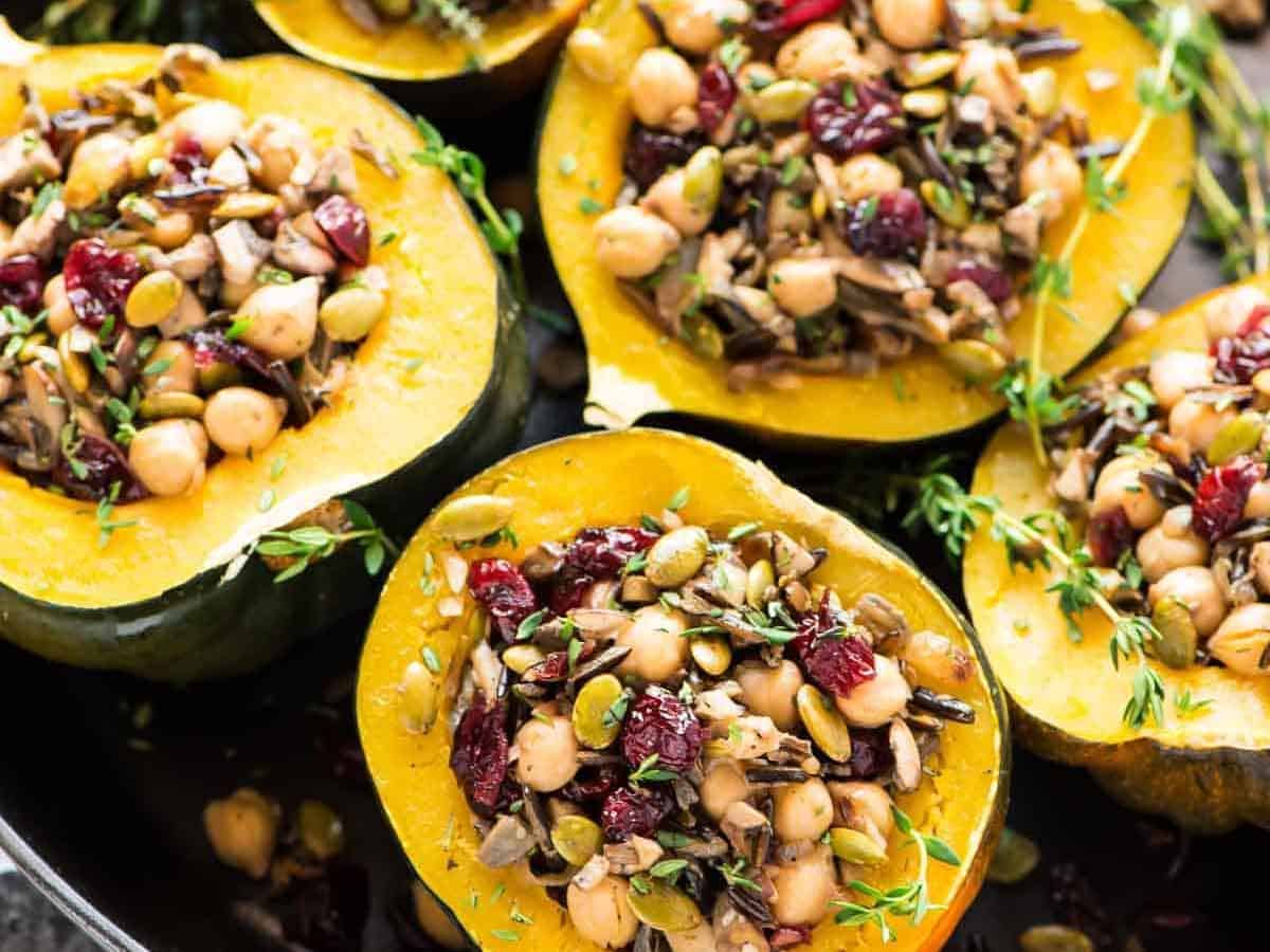 Instant Pot Stuffed Acorn Squash with Wild Rice, Cranberry, Mushroom and Chickpeas. A healthy, filling vegetarian or vegan meal that’s so easy and delicious! {vegan, gluten free}