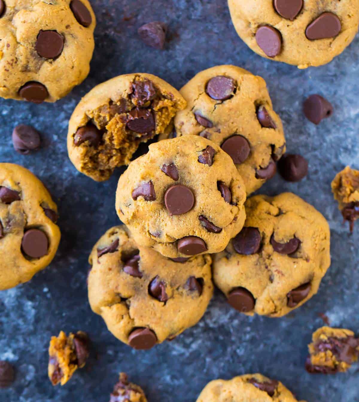 Overhead view of chocolate chip coconut flour cookies piled on countertop