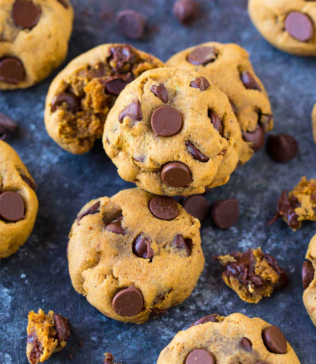 Chocolate chip coconut flour cookies stacked on countertop