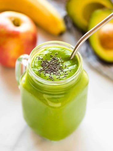 Cleansing Apple Avocado Smoothie with banana, ginger, and spinach. Vegan, high fiber, and perfect for weightloss, this easy, creamy vegan green smoothie will keep you full all morning! #greensmoothie #avocadosmoothie #healthy #weightloss