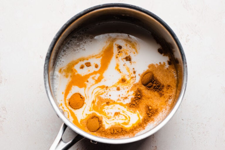 ingredients for a warm vegan turmeric latte before bed to help you sleep