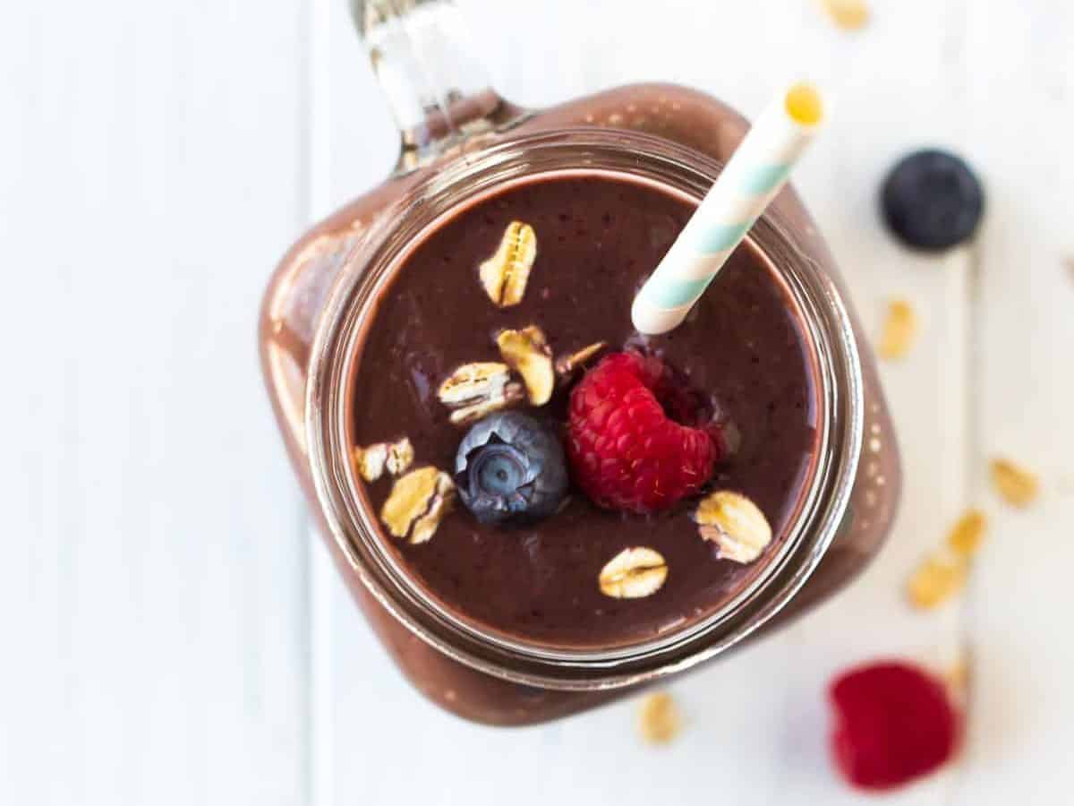 Immune Boosting Turmeric Smoothie with blueberry, spinach, ginger, oatmeal, and honey. A perfect breakfast to kick start your mornings! This easy smoothie is great for kids because you can't see the green. Other health benefits include acting as a natural cold remedy and anti-inflammation drink