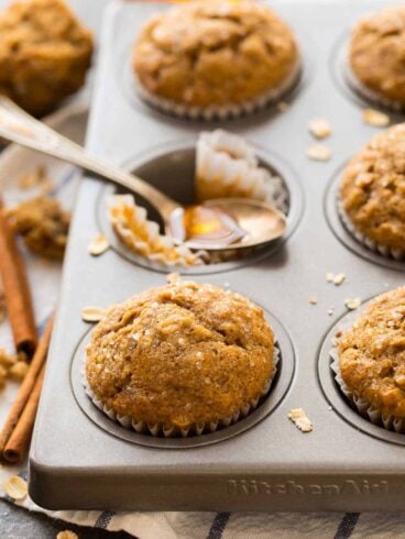 A delicious and healthy recipe for Applesauce Muffins with oatmeal, cinnamon, and honey. Healthy, tasty muffins with no sugar and no butter! The perfect healthy muffins for kids and grown-ups too!