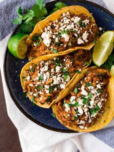 Easy Instant Pot Chicken Mole from scratch! Quick recipe that tastes authentic but is made fast in the Instant Pot. Perfect for Mexican enchiladas, tacos, and rice.