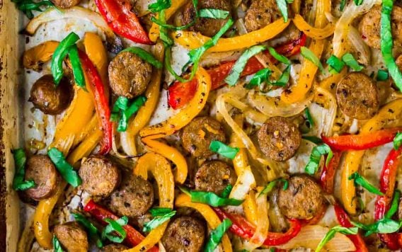 Easy Italian Sausage and Peppers in the Oven. A flavorful, healthy all-in-one dinner! Use to top sandwiches, in pasta, or serve over rice. Great for family dinners or for a crowd!