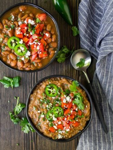 The BEST Crock Pot Pinto Beans! Easy, healthy recipe that tastes even better than a restaurant. No soaking required! Use this healthy slow cooker pinto beans recipe anytime you need canned beans, or mash it to make slow cooker refried beans.