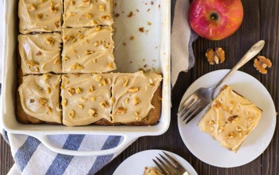 Old Fashioned Fresh Apple Cake with Caramel Cream Cheese Frosting. INCREDIBLE autumn flavor and a must bake in the fall! Moist, fluffy, and the cream cheese frosting is to die for! Better than the Pioneer Woman!
