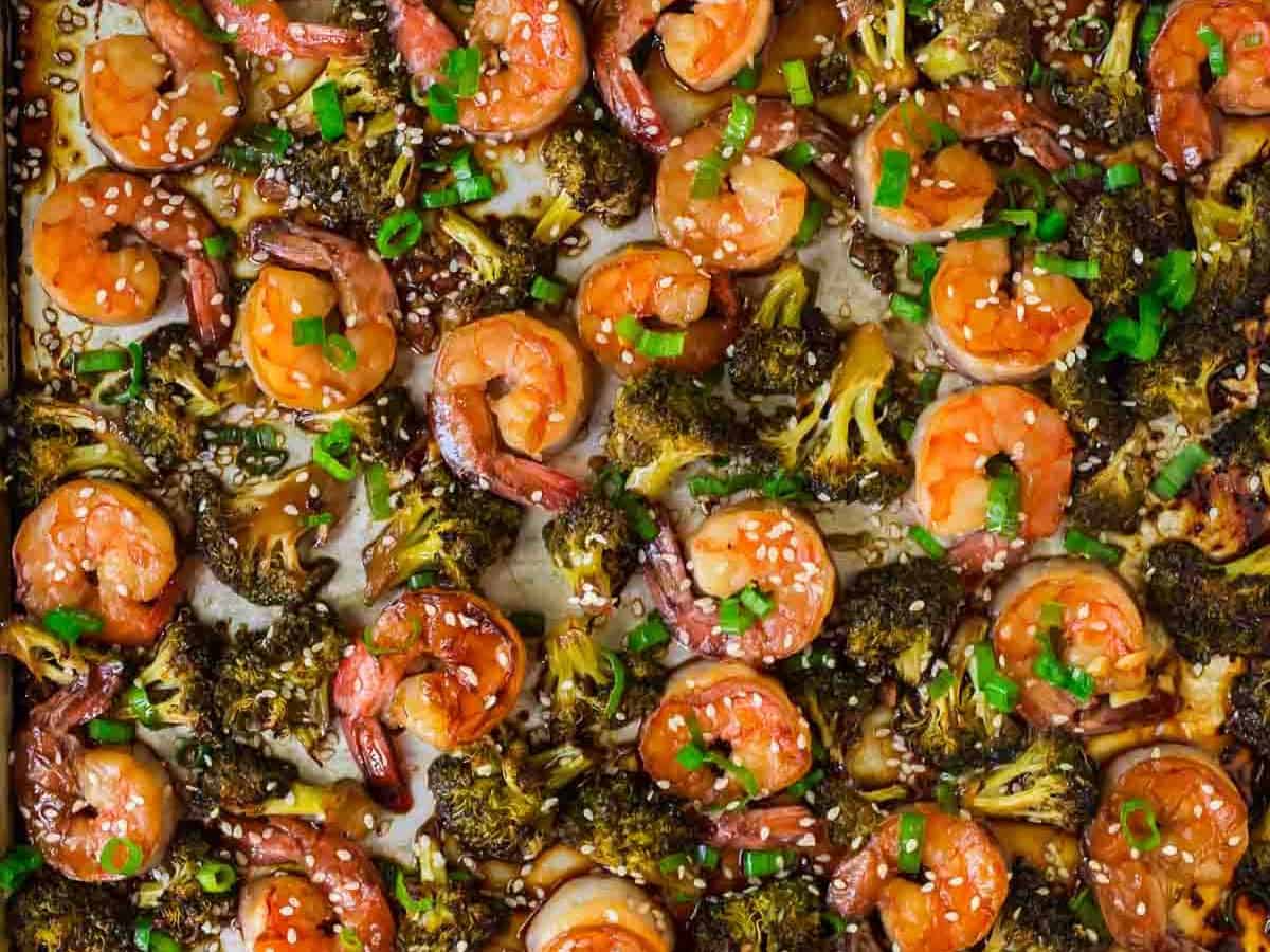 Healthy Sheet Pan Shrimp and Broccoli. Easy and DELICIOUS! Tastes like your favorite Chinese stir fry shrimp and broccoli but is so much better for you. Cooks on ONE PAN and the Chinese brown sauce is incredible. Serve with rice or quinoa for fast and healthy weeknight dinner.