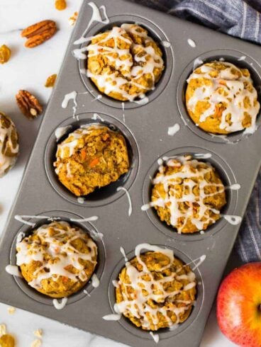Moist Apple Carrot Muffins. An easy and healthy recipe with no sugar! Made with oatmeal, Greek yogurt, and maple syrup, they are naturally sweetened, filling, and great for healthy breakfasts and snacks. A favorite for toddlers AND for adults!