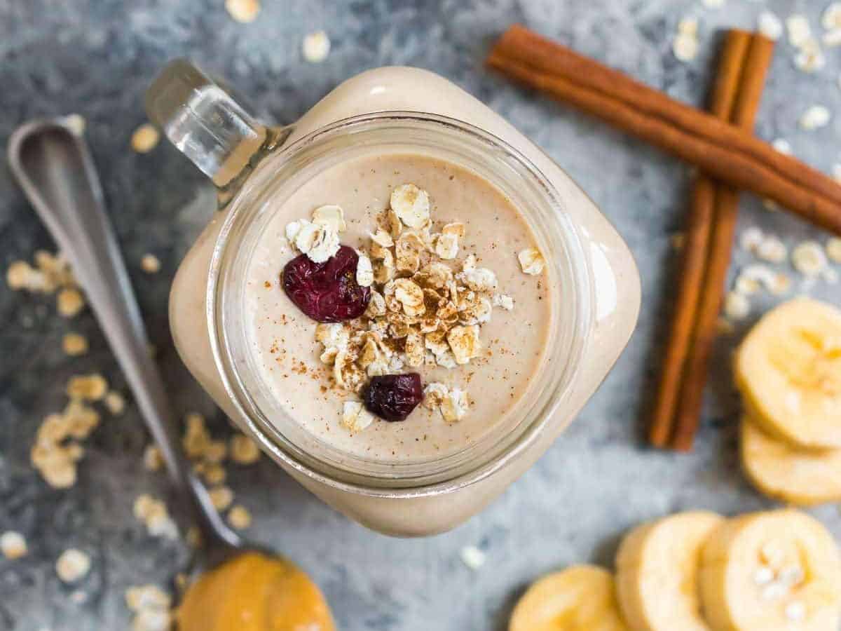 Filling and healthy Oatmeal Smoothie with peanut butter, banana, and cinnamon. With benefits like fiber, protein, healthy fats, and whole grains, this vegan breakfast smoothie will keep you full for hours! Great for breakfast, kids, and for weight loss too!