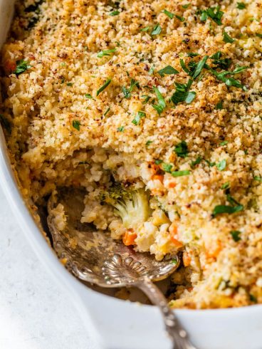 a spoon scooping Vegetarian Broccoli Rice Casserole