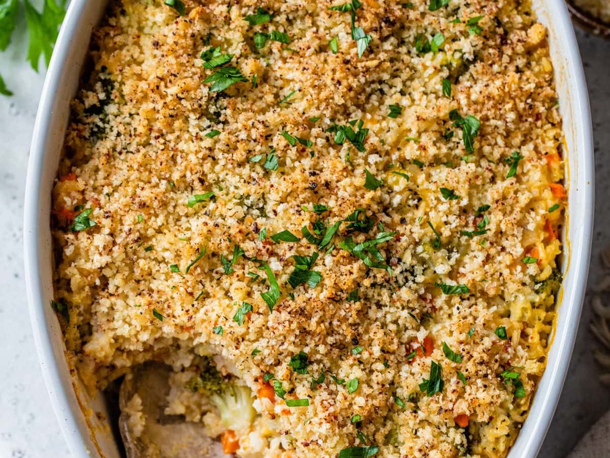 A white baking dish with a southern broccoli rice casserole recipe