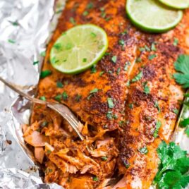 Salmon that is done cooking and flakes easily with a fork