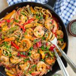 A skillet of creamy and healthy Cajun Shrimp Pasta