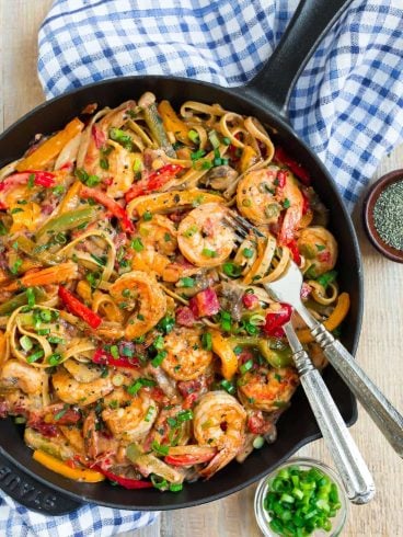 A skillet of creamy and healthy Cajun Shrimp Pasta