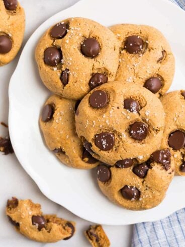 A white plate with chocolate chip almond flour cookies