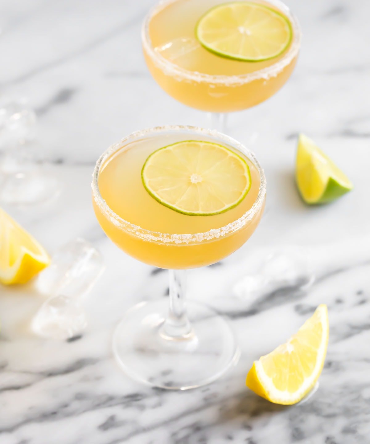 Two glasses filled with Italian margarita